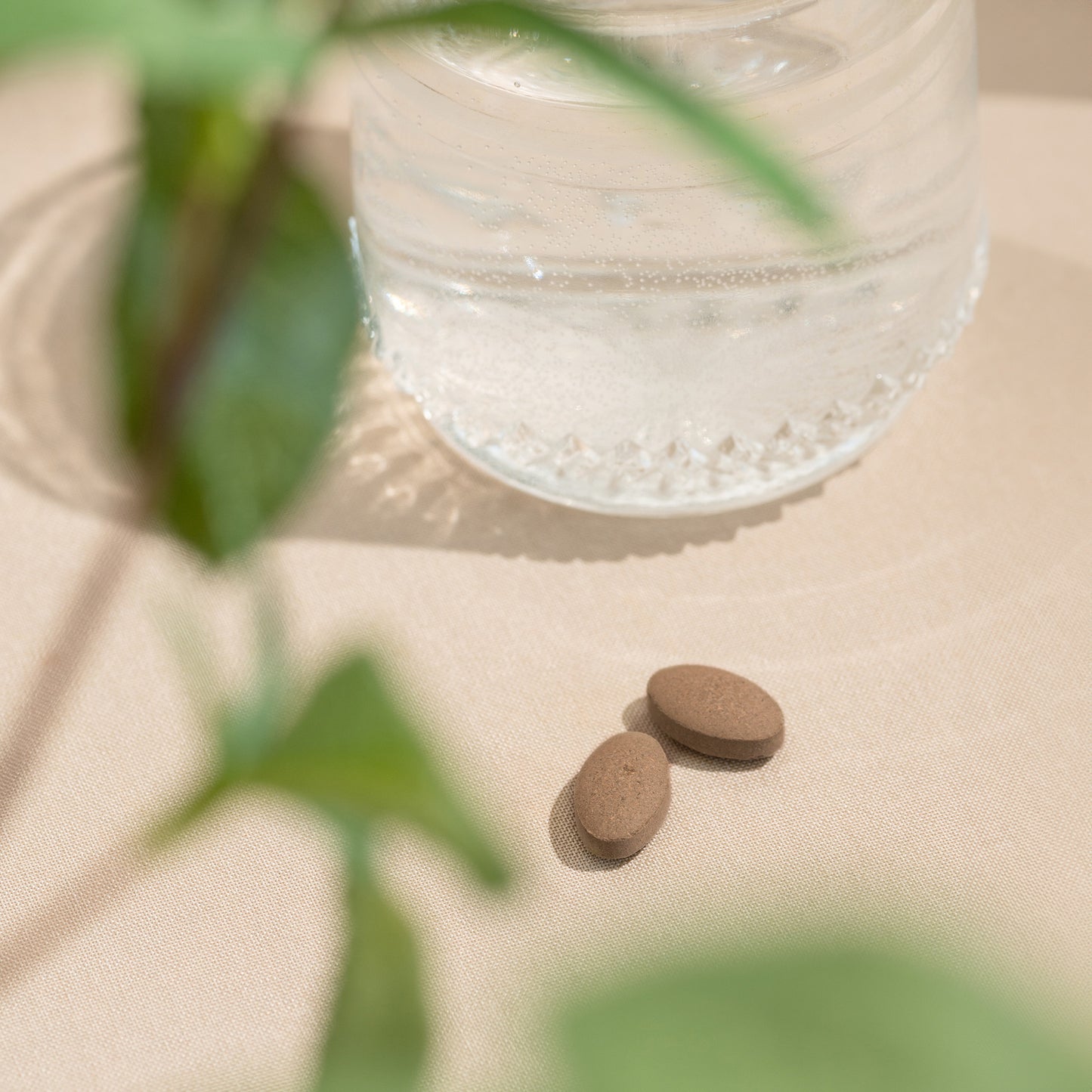 Heart Formula Tablets and water glass