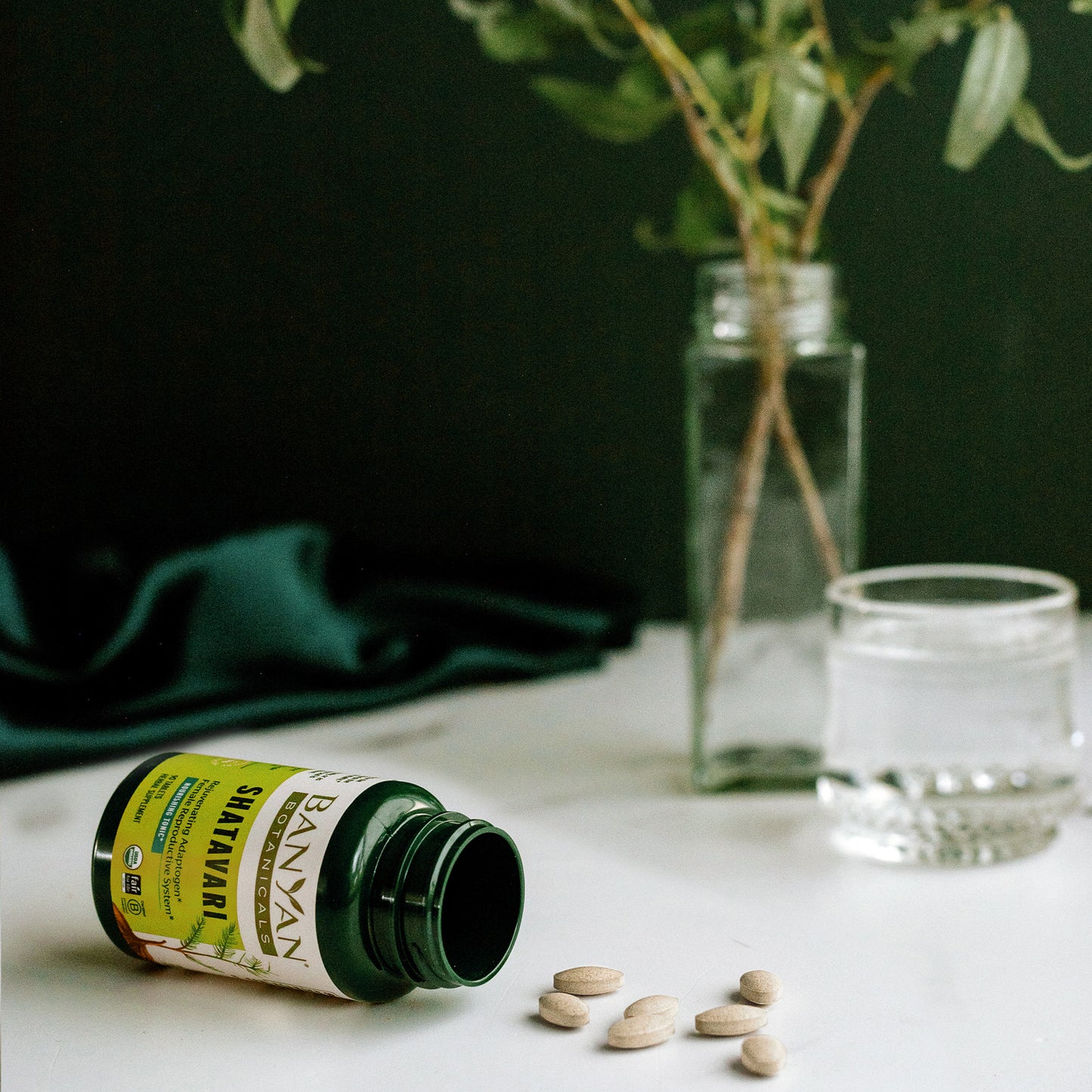 shatavari tablets on counter next to bottle