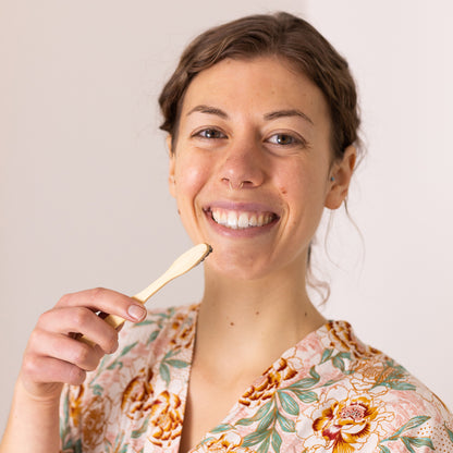 Charcoal Tooth Powder with model